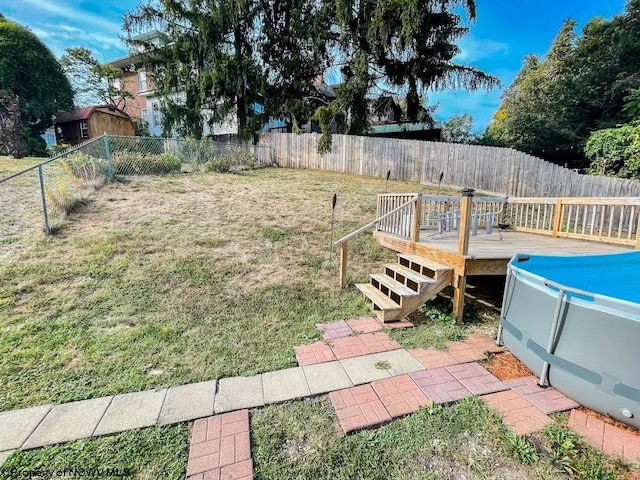 view of yard with a deck