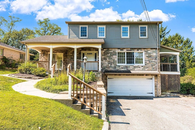view of front facade with driveway, an attached garage, covered porch, stairs, and stone siding