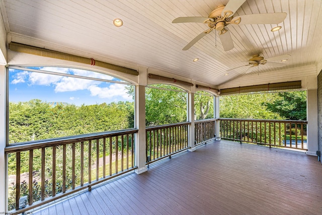 wooden deck with ceiling fan