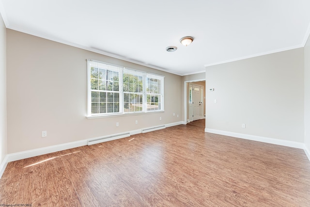 unfurnished room featuring a baseboard radiator, baseboards, wood finished floors, and crown molding
