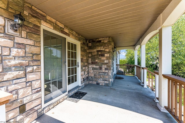 view of patio featuring a porch