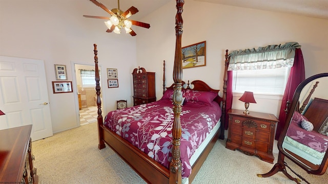 bedroom featuring connected bathroom, ceiling fan, light colored carpet, and high vaulted ceiling