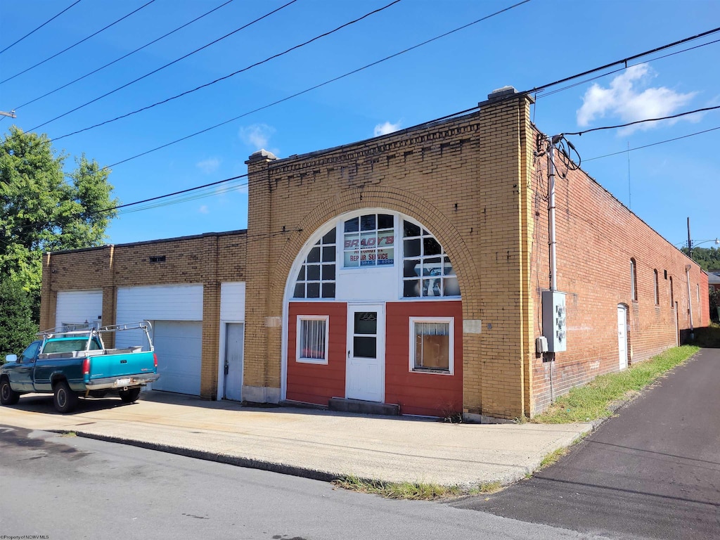 view of building exterior featuring a garage