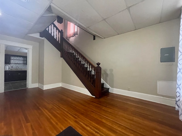 stairway with wood-type flooring