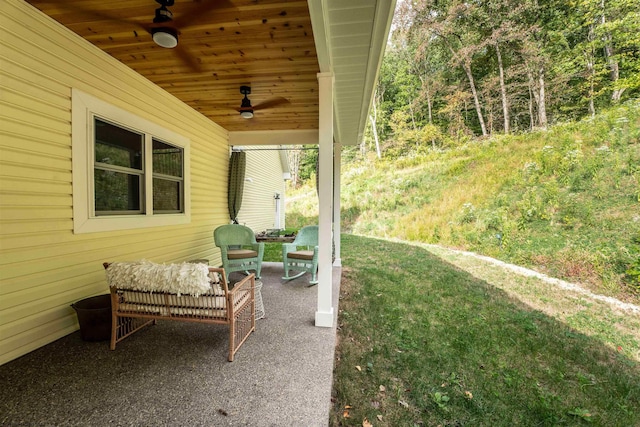 view of patio featuring ceiling fan