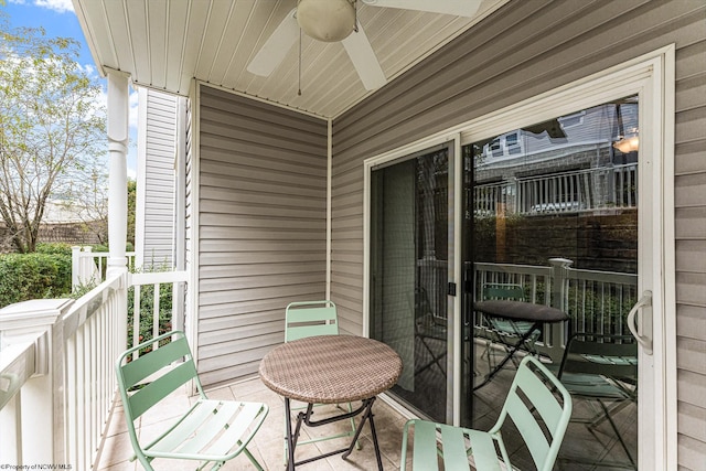 balcony featuring ceiling fan