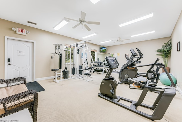 gym with carpet floors and ceiling fan