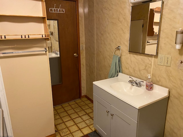 bathroom featuring tile patterned floors and vanity