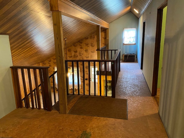 hall featuring wood ceiling and lofted ceiling