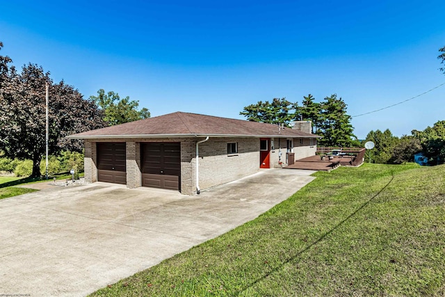 garage with a lawn