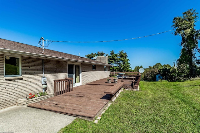 deck featuring a yard