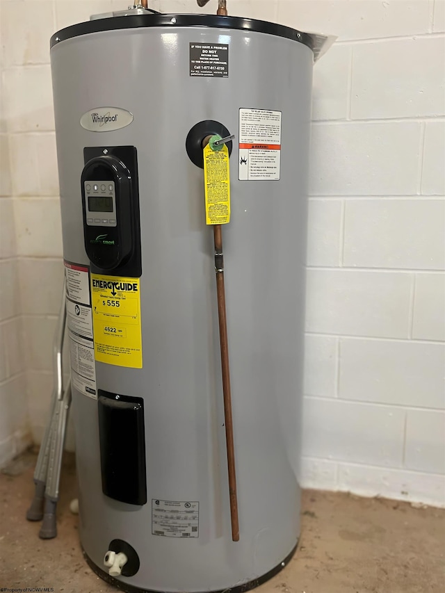 utility room with electric water heater