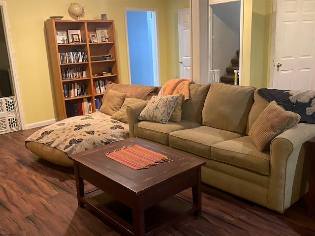 living room with dark wood-type flooring