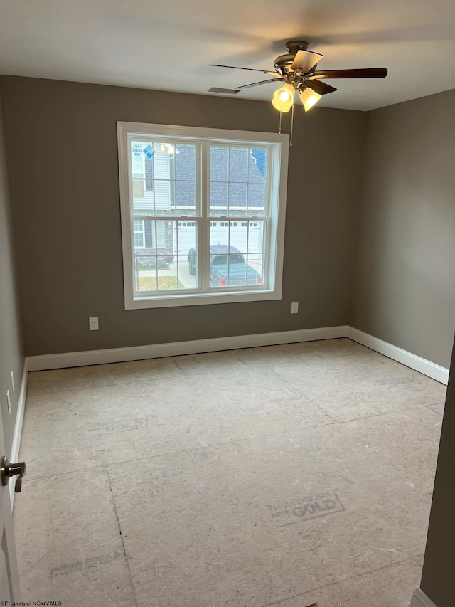 empty room featuring ceiling fan