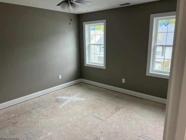 spare room featuring ceiling fan