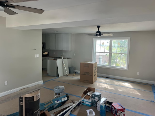 living room featuring ceiling fan