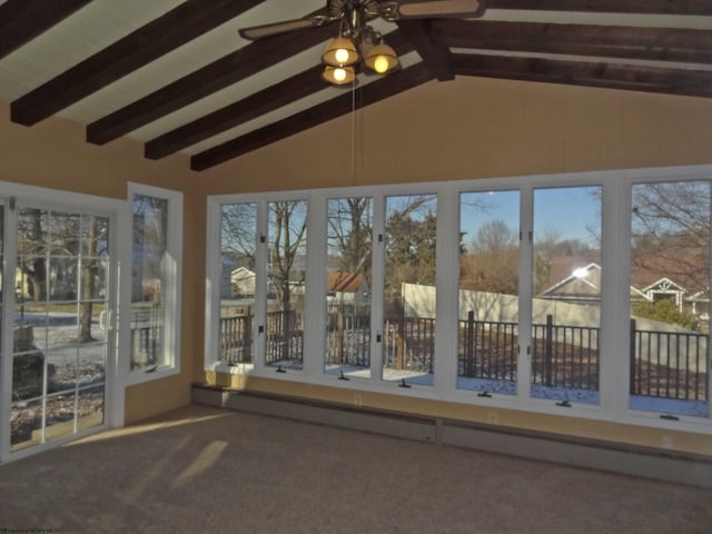 unfurnished sunroom featuring vaulted ceiling with beams and ceiling fan