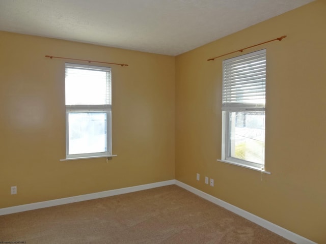 view of carpeted spare room