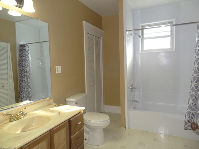 full bathroom with shower / tub combo with curtain, vanity, and toilet