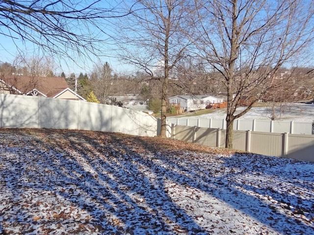 view of snowy yard