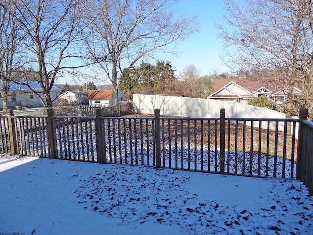 view of yard covered in snow