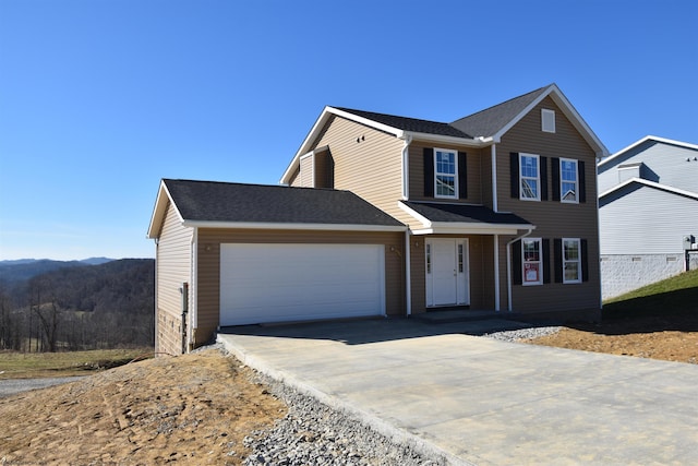 view of front of property featuring a garage