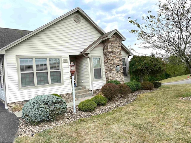 view of front of house with a front lawn