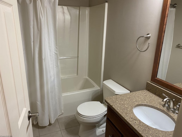 bathroom with toilet, vanity, shower / bath combo, and tile patterned floors