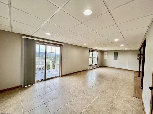 unfurnished room with light tile patterned floors, recessed lighting, and baseboards