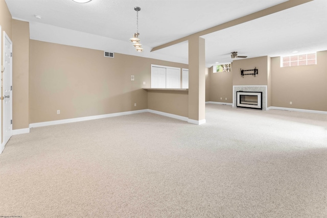 basement featuring light colored carpet