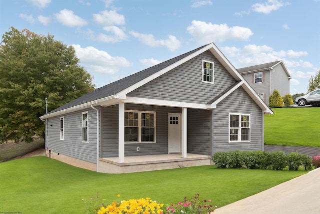 view of front of house featuring a porch and a front lawn