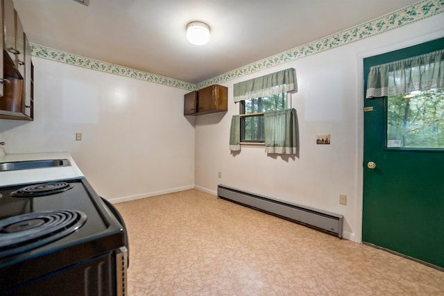 kitchen featuring baseboard heating, electric range, and sink