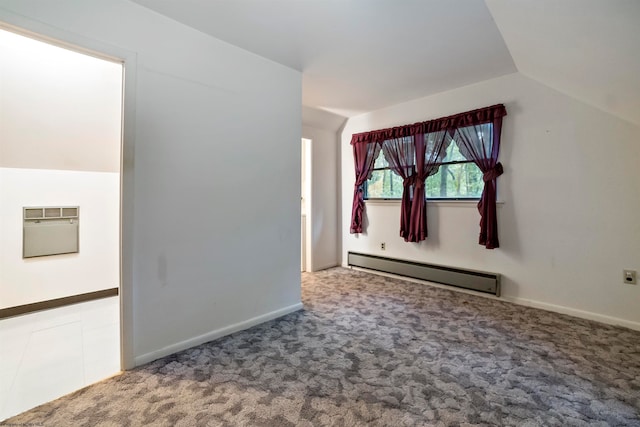 carpeted spare room featuring baseboard heating and vaulted ceiling