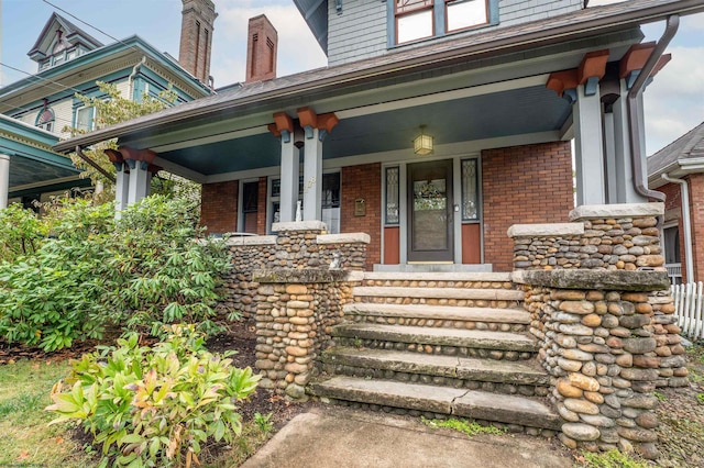 entrance to property with covered porch