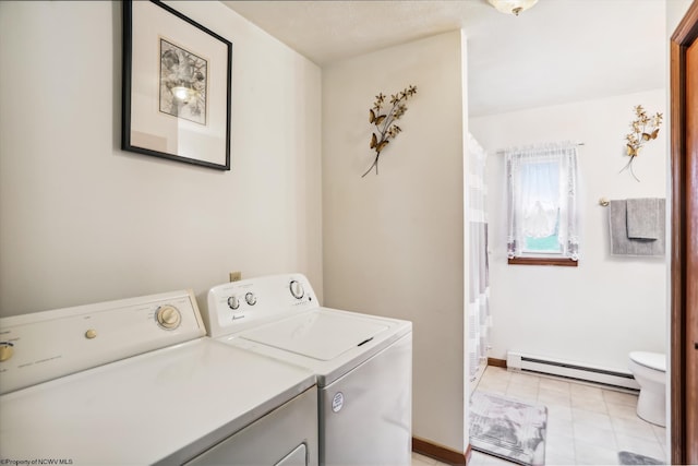 washroom with independent washer and dryer and a baseboard radiator