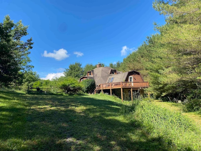 view of yard featuring a deck