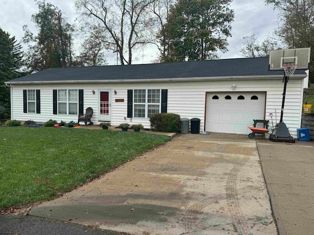 ranch-style house with concrete driveway, a front lawn, and an attached garage