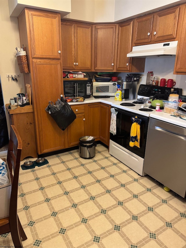 kitchen with brown cabinets, light floors, electric range oven, white microwave, and under cabinet range hood