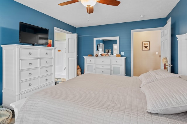 bedroom featuring ceiling fan and connected bathroom