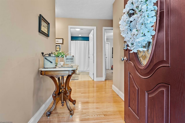 foyer entrance featuring light wood-type flooring