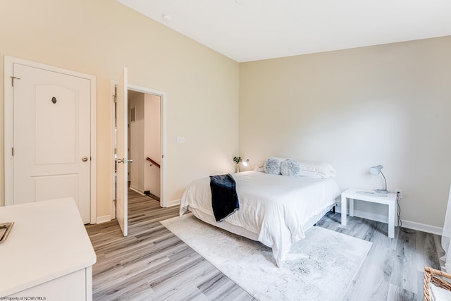 bedroom featuring light wood-type flooring