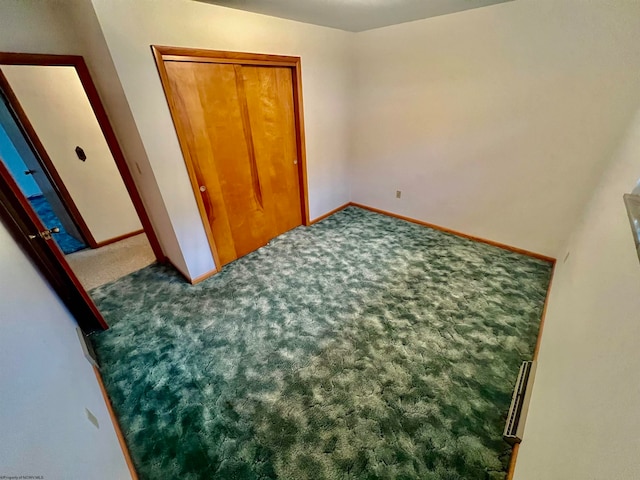 bedroom with a closet and carpet flooring