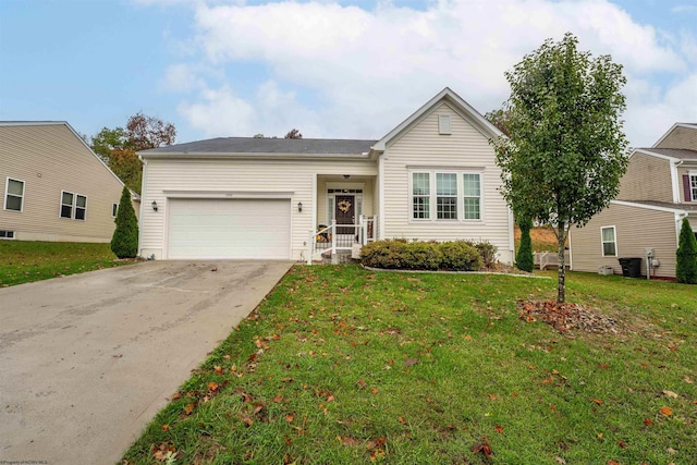 single story home featuring a front yard and a garage