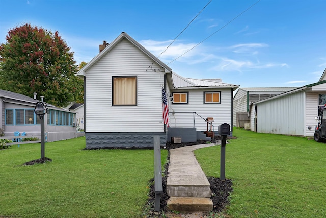 exterior space with a front lawn