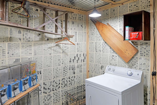 clothes washing area featuring washer / clothes dryer