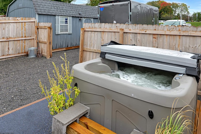 exterior space featuring a hot tub