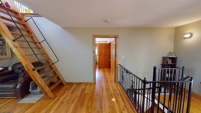 corridor featuring light hardwood / wood-style floors