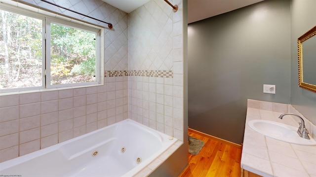 bathroom featuring vanity and hardwood / wood-style floors