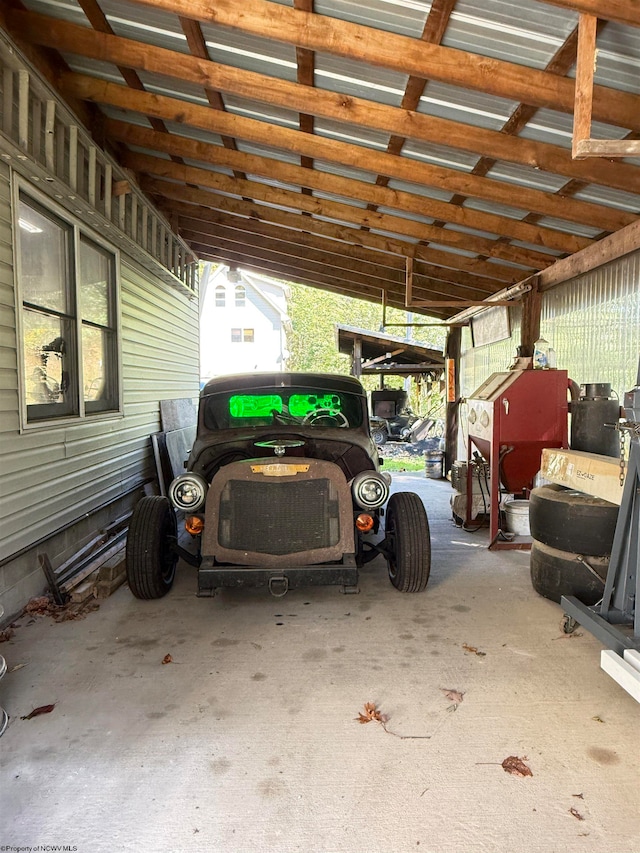 garage with a carport