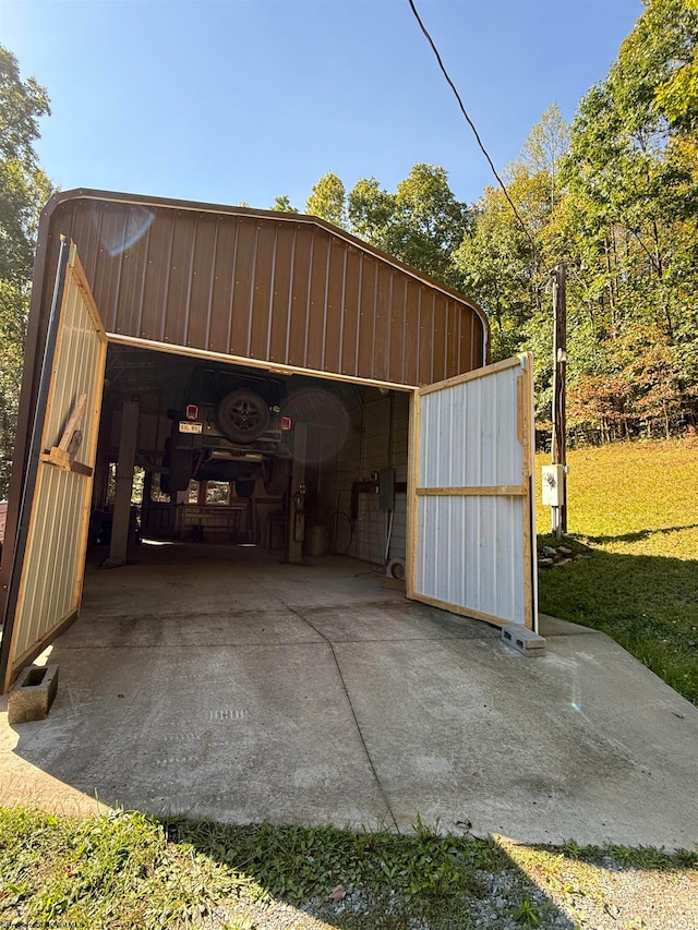 garage featuring a yard